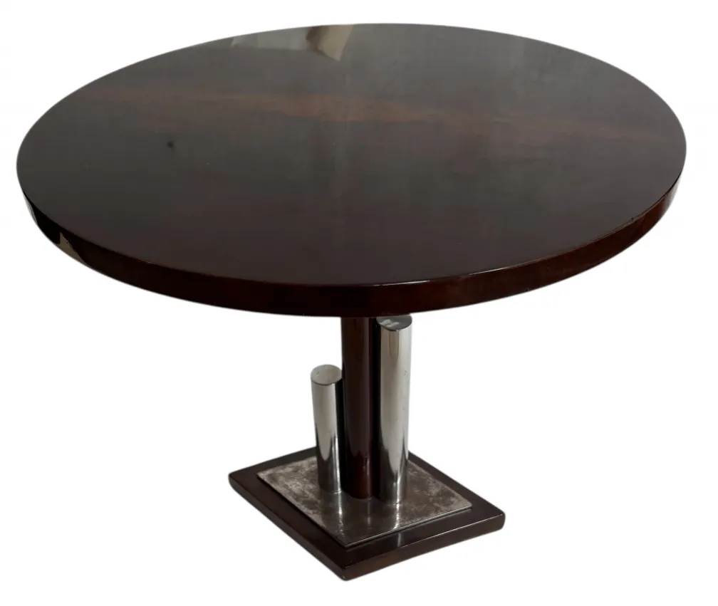 mesa redonda con base metálica, estilo art deco