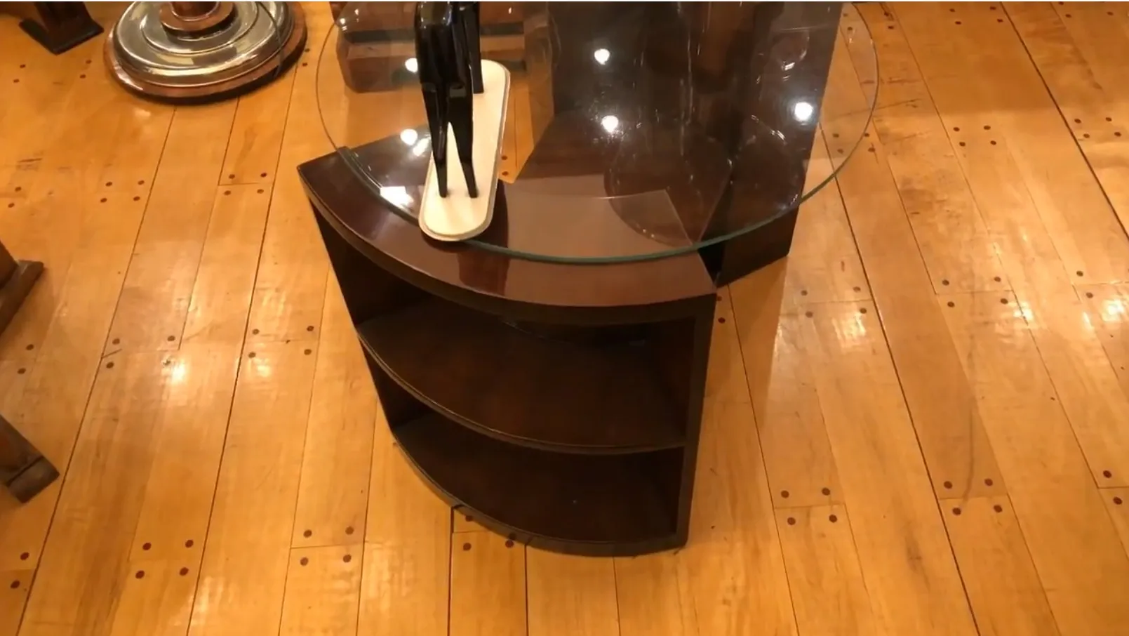 antique curved table design with decoration, in a cozy setting