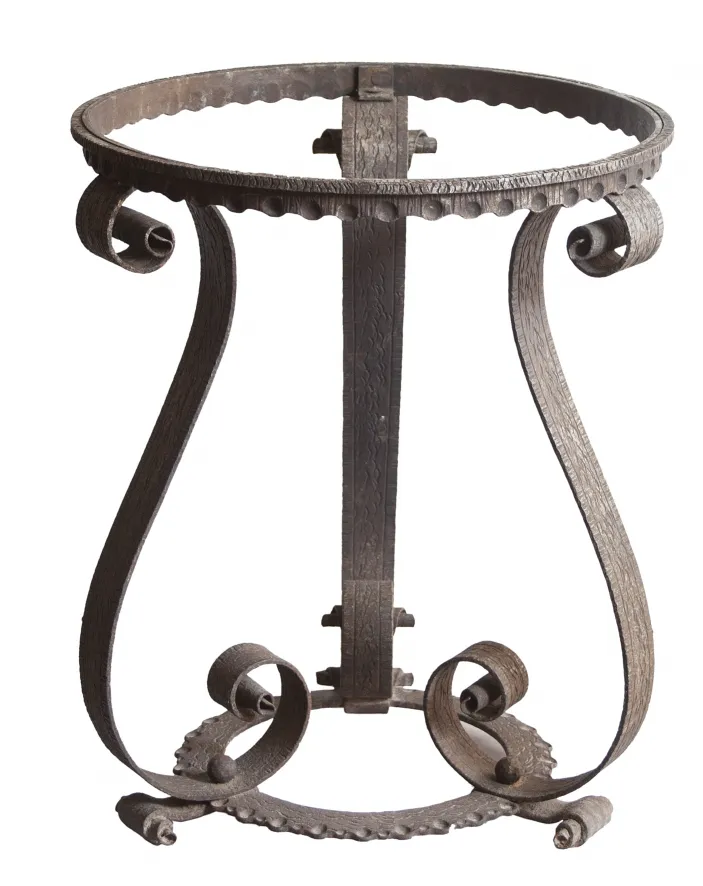 antique table with art deco design and detailed base