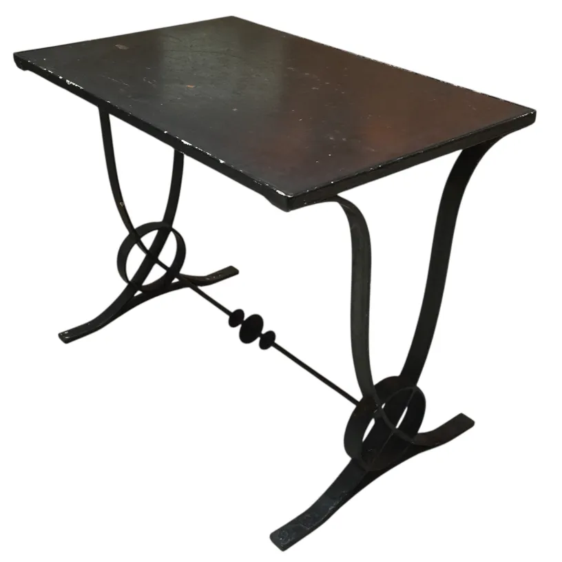 antique art deco table with elegant design and curved legs