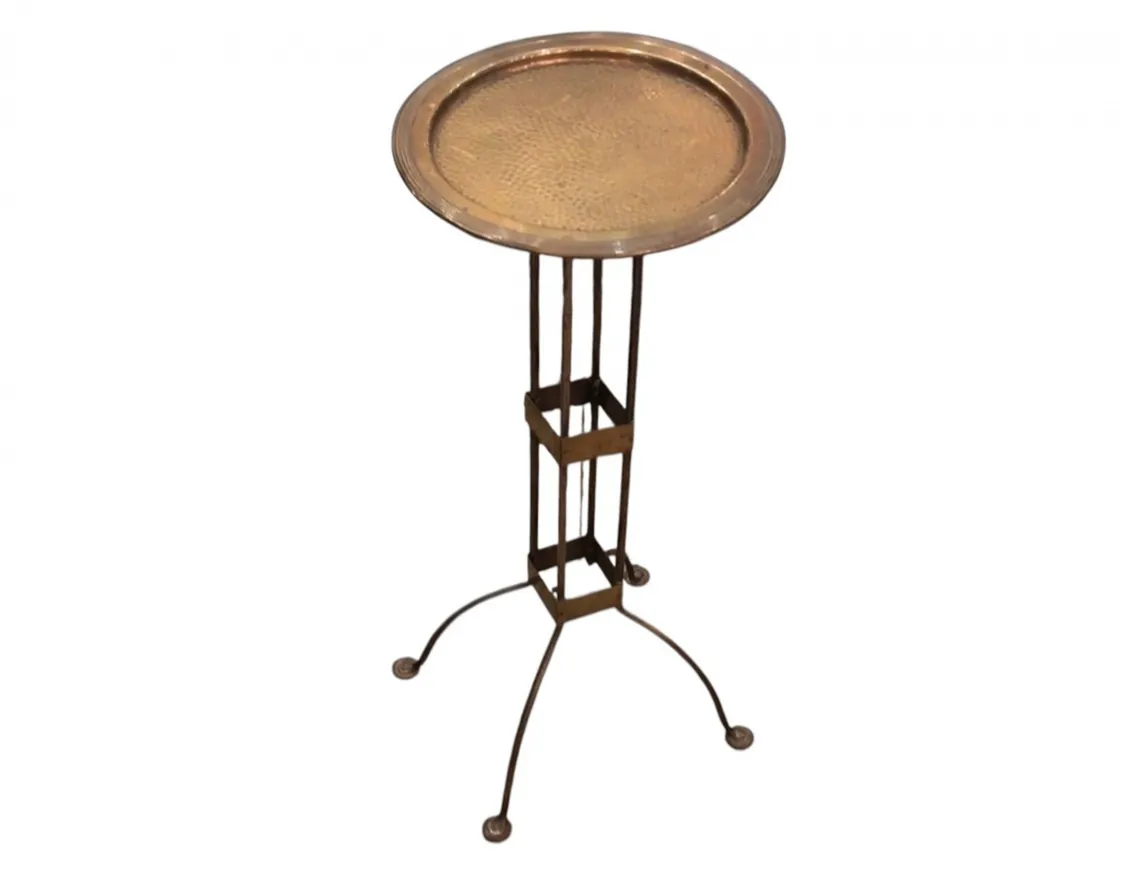 antique secessionist table with metal tray, artistic details.