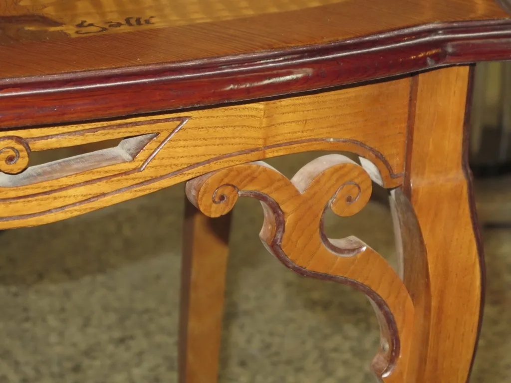 antique dining table for two people with decorative details