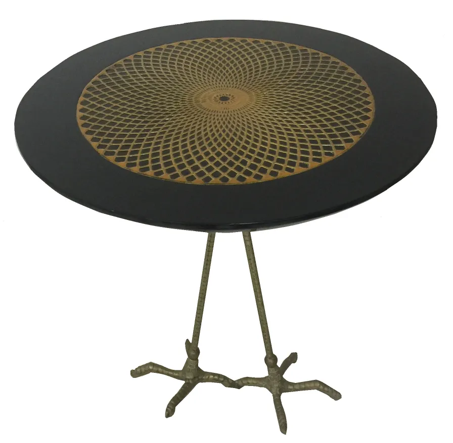 mesa antigua redonda con diseño en espiral y patas delgadas