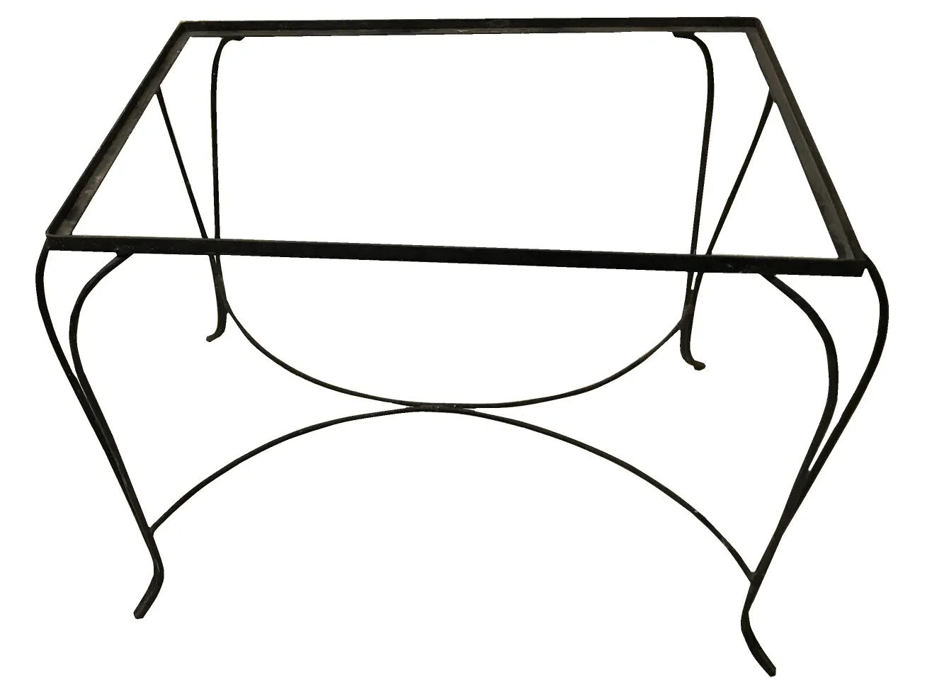 mesa antigua con patas de diseño curvado y estructura de jardín