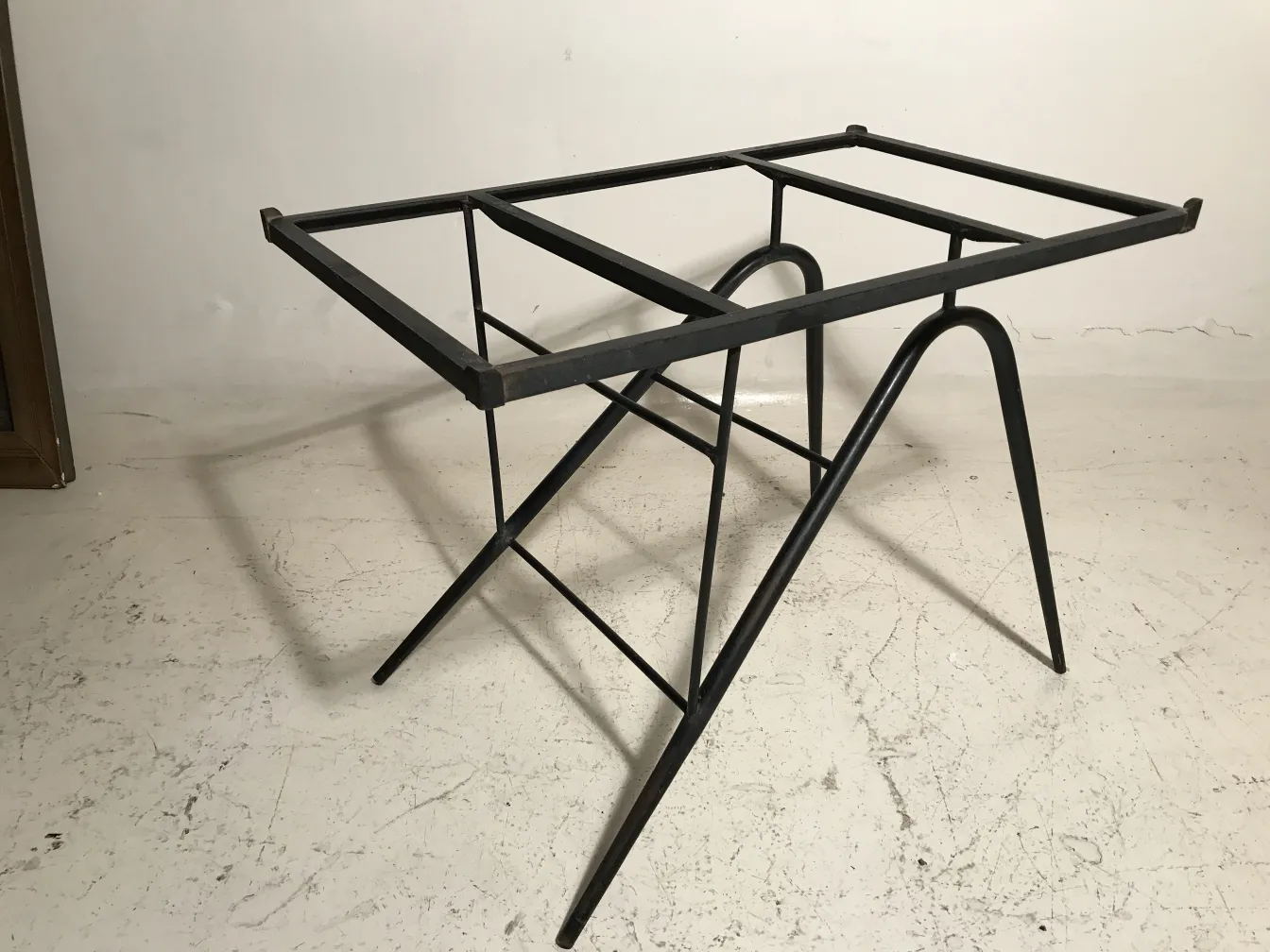 Antique garden table with visible support structure