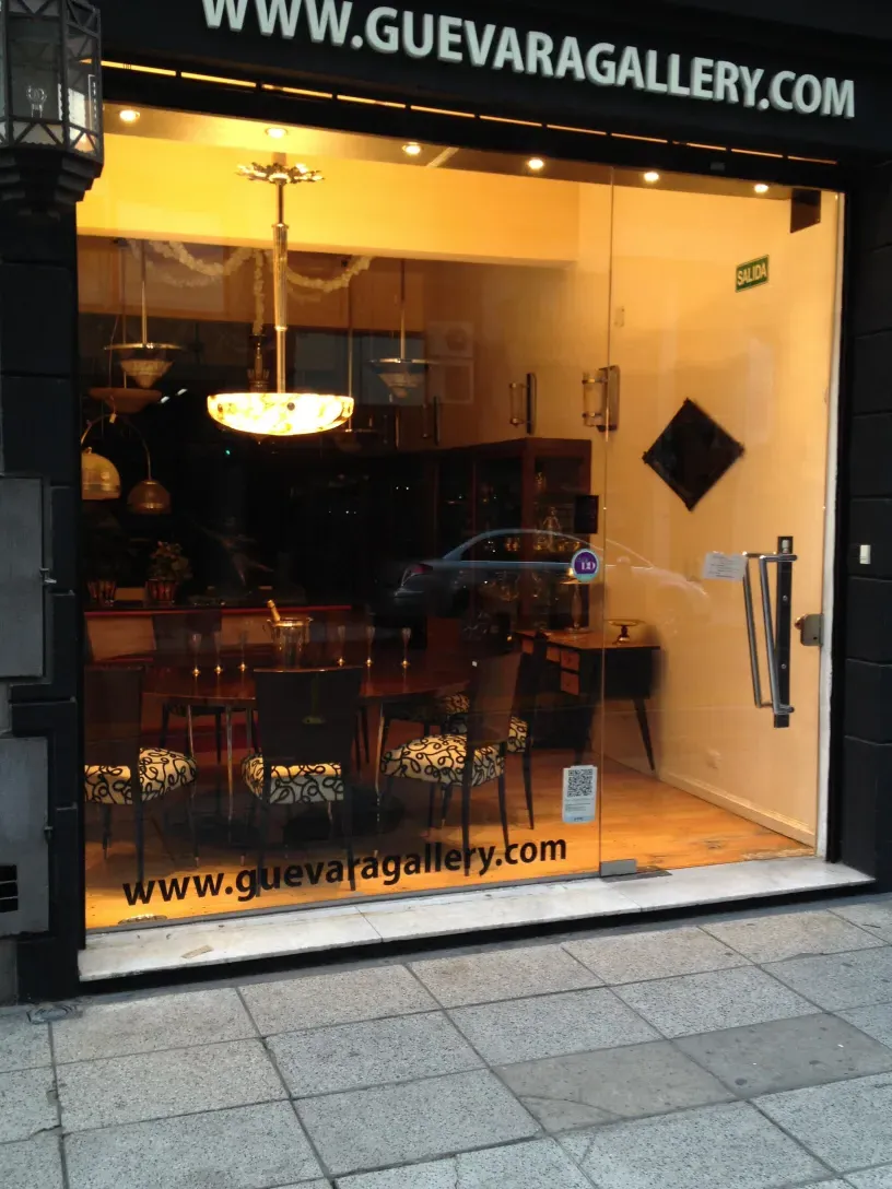 Details of antique door handles in shop window