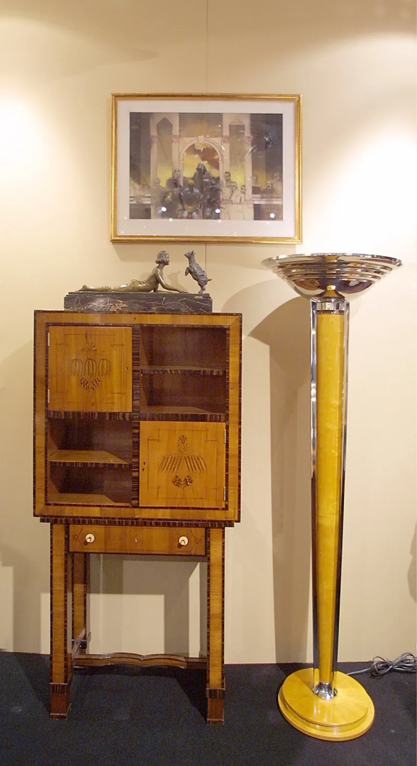 Antique cigar humidor with detailed decoration in an elegant setting.