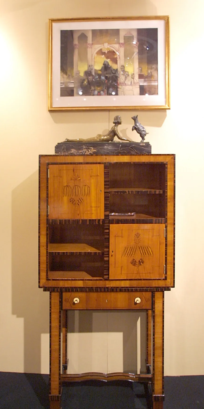 Antique cigar humidor with multiple compartments and decoration