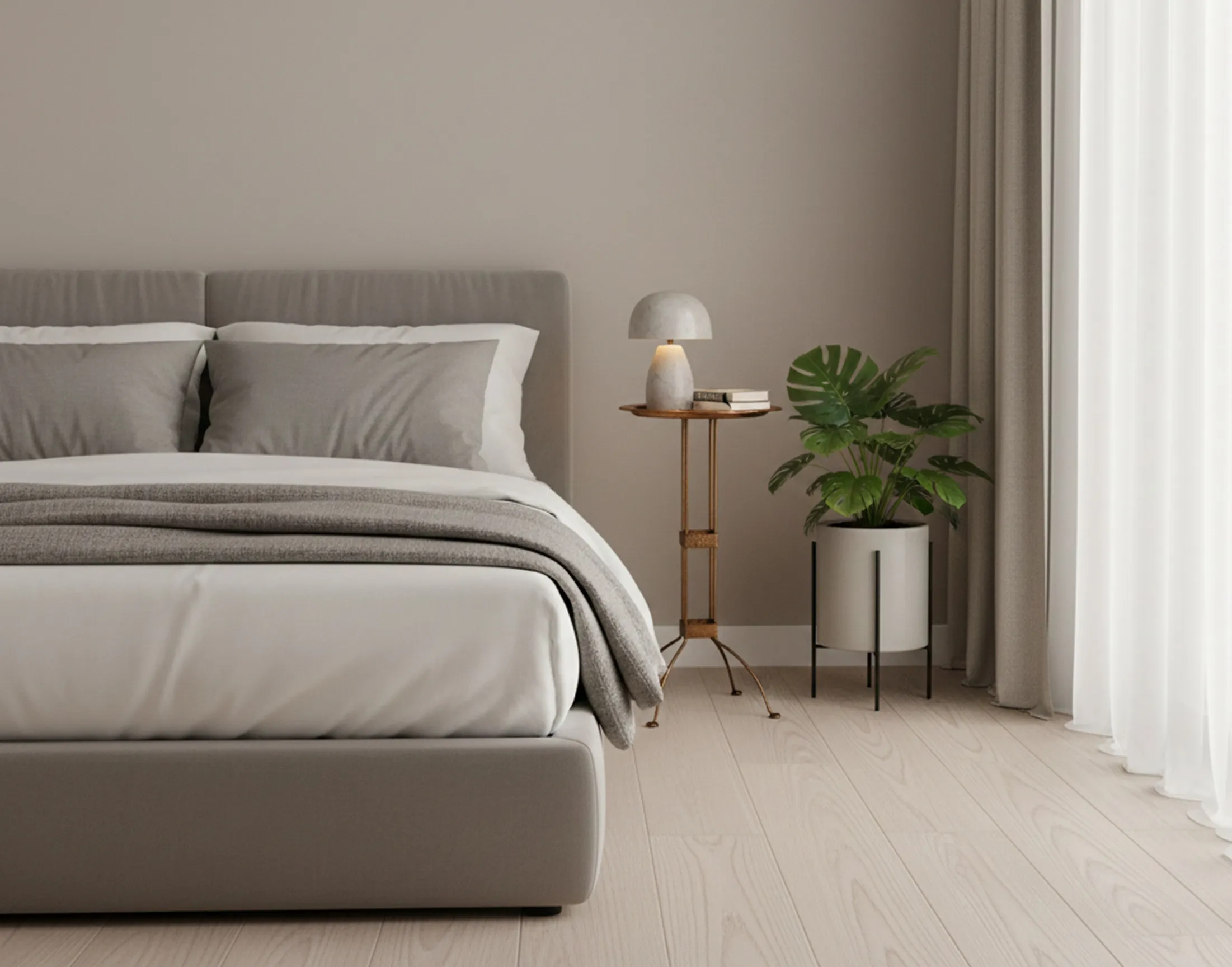 Mesa antiga decorando um quarto moderno, com luz suave e plantas.