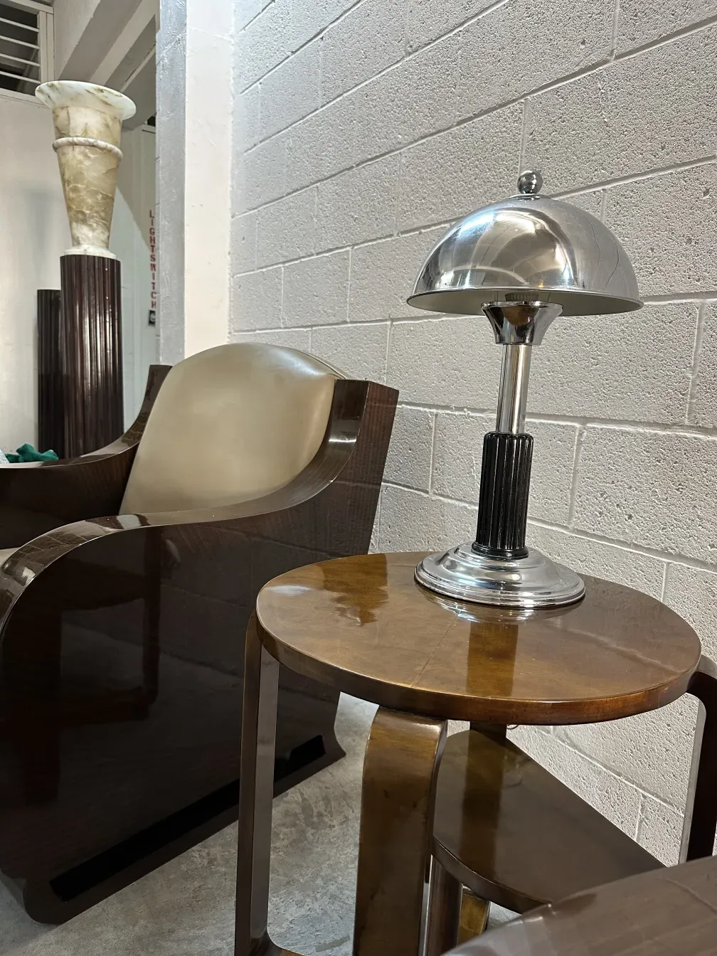 antique art deco table lamp in a modern wood setting