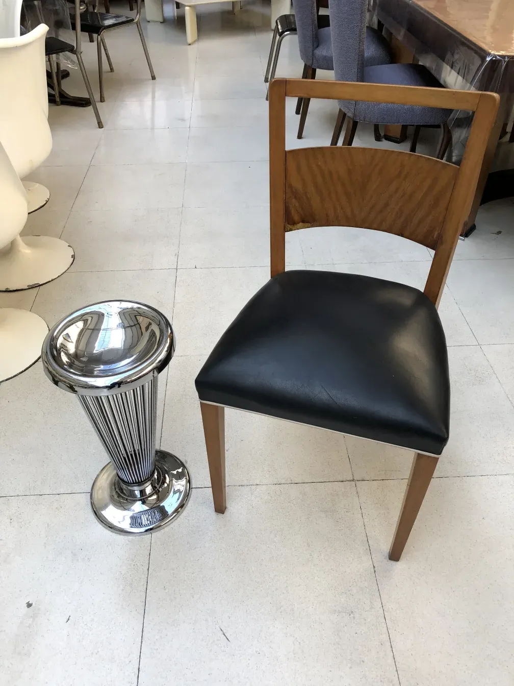 Antique standing ashtray by Warren Platner, shiny design.