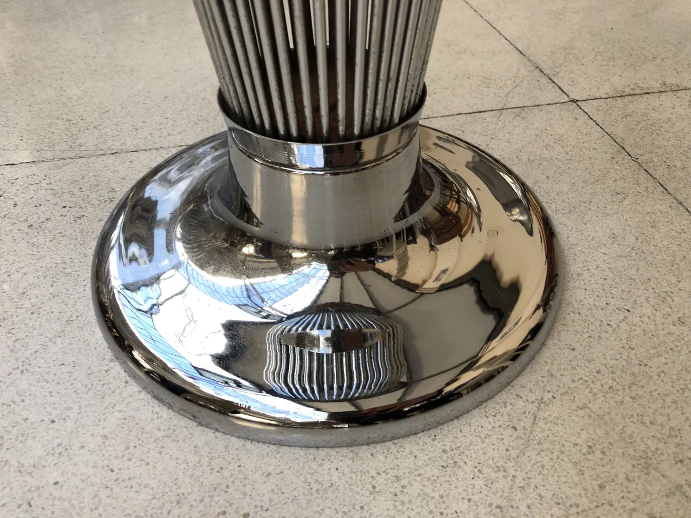 Antique standing ashtray with a shiny base and elegant design, warren platner