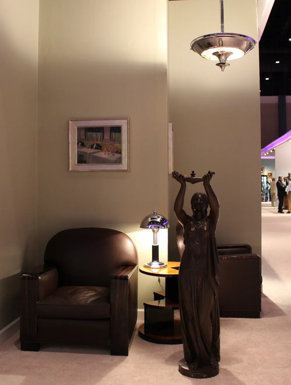 two antique hanging lamps with art deco design illuminating a cozy setting