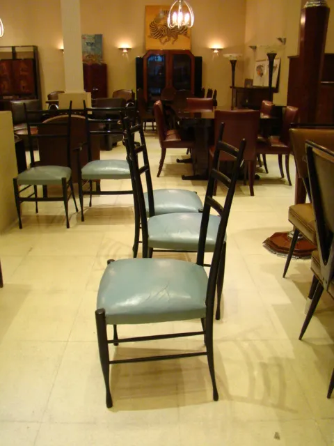 antique dining table for 8 people with blue chairs