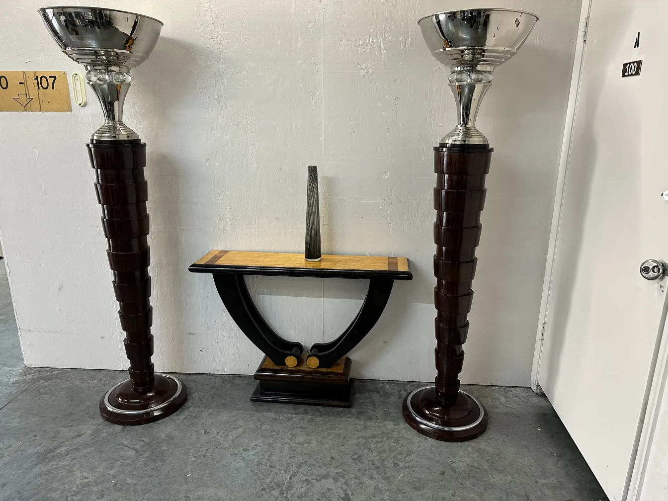 Two antique Murano vases in an elegant setting.