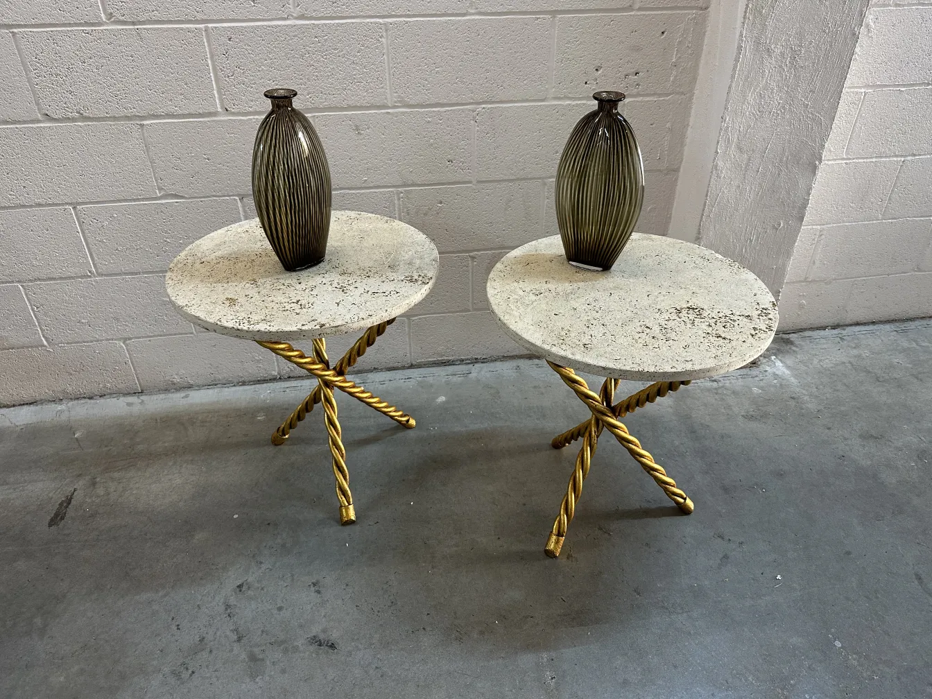 Two antique Murano vases on decorative table