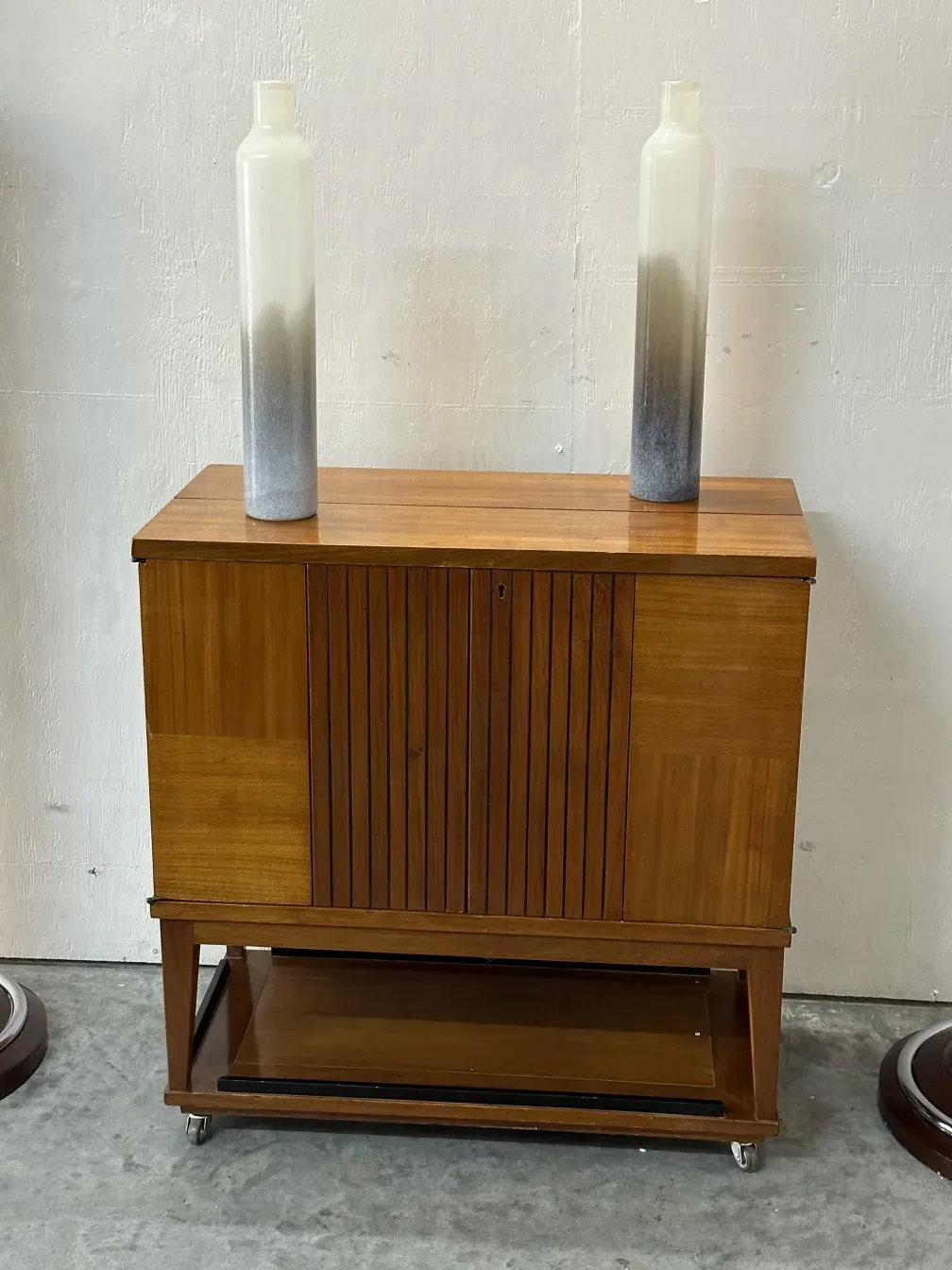 2 antique Murano vases displayed with a stand