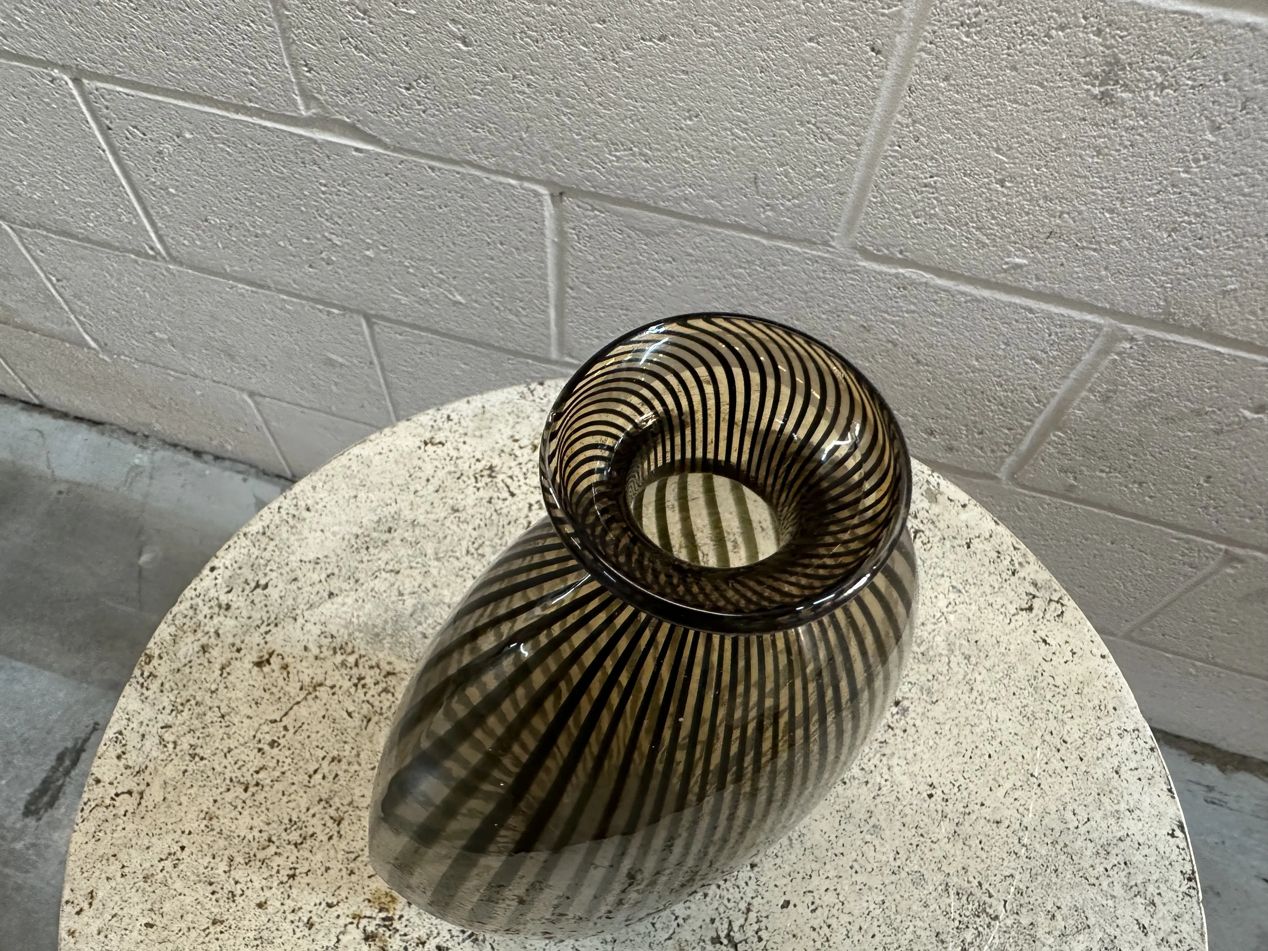 antique Murano vase with elegant patterns in a minimalist setting