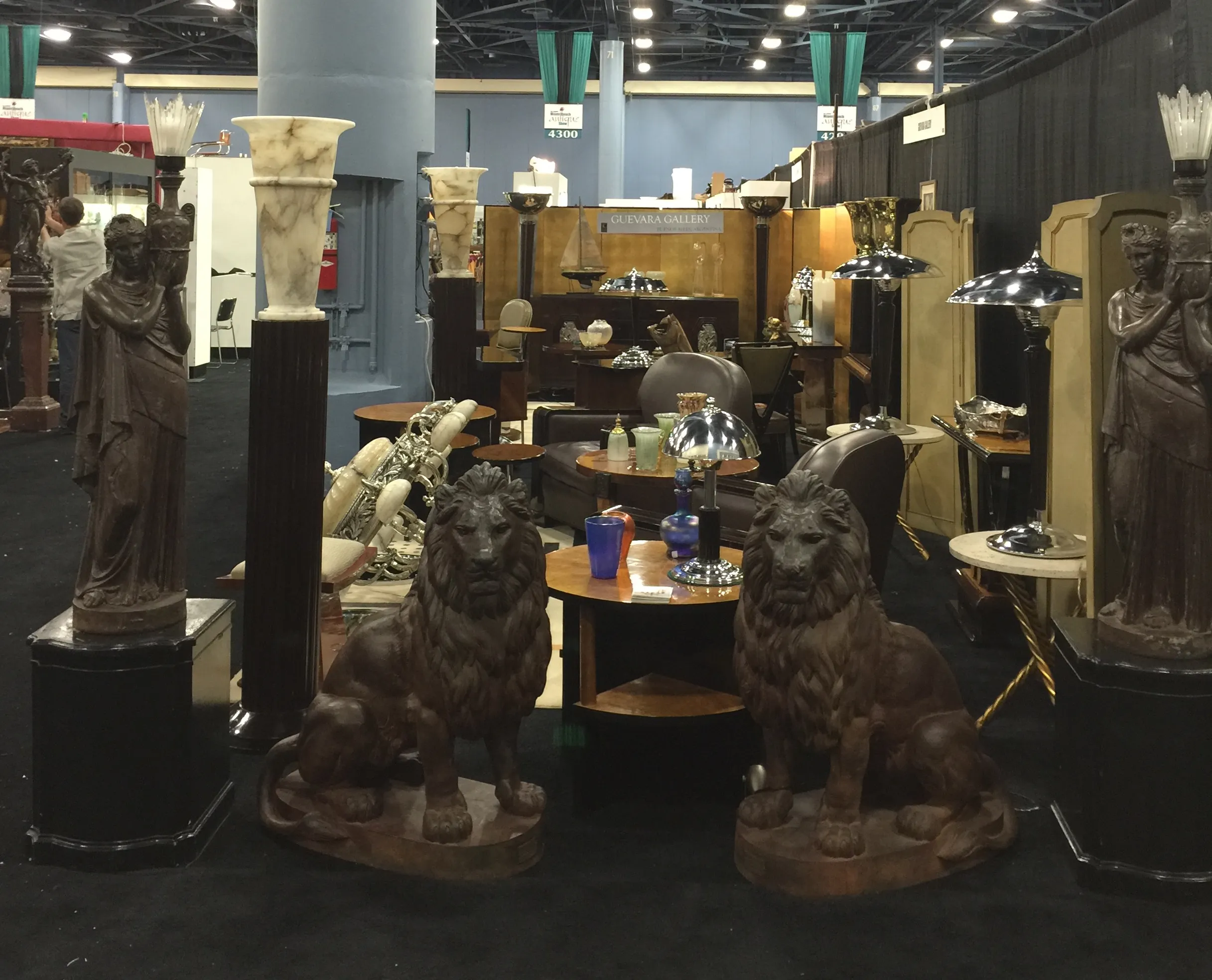 two stone lions in an antique sculpture, exhibition environment