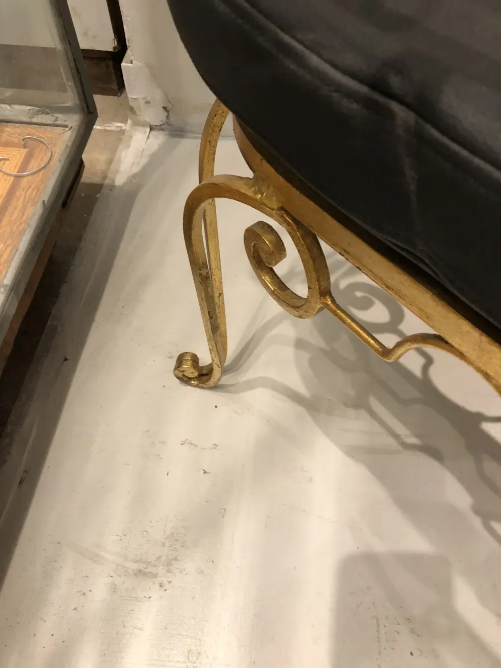 two antique garden armchairs with art deco design in a cozy setting