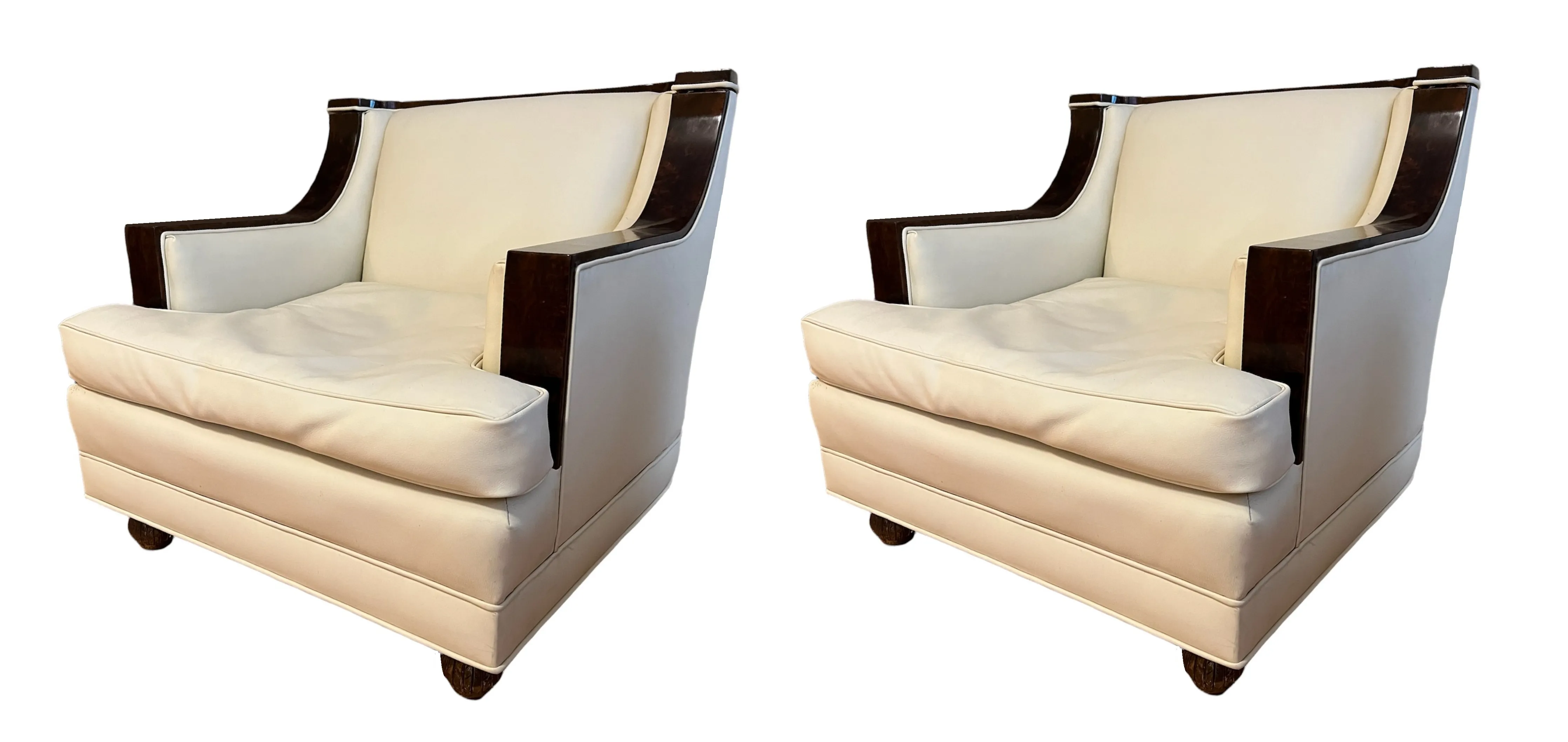 Pair of antique armchairs with light color finish, featuring a comfortable and elegant design, suitable for any setting.