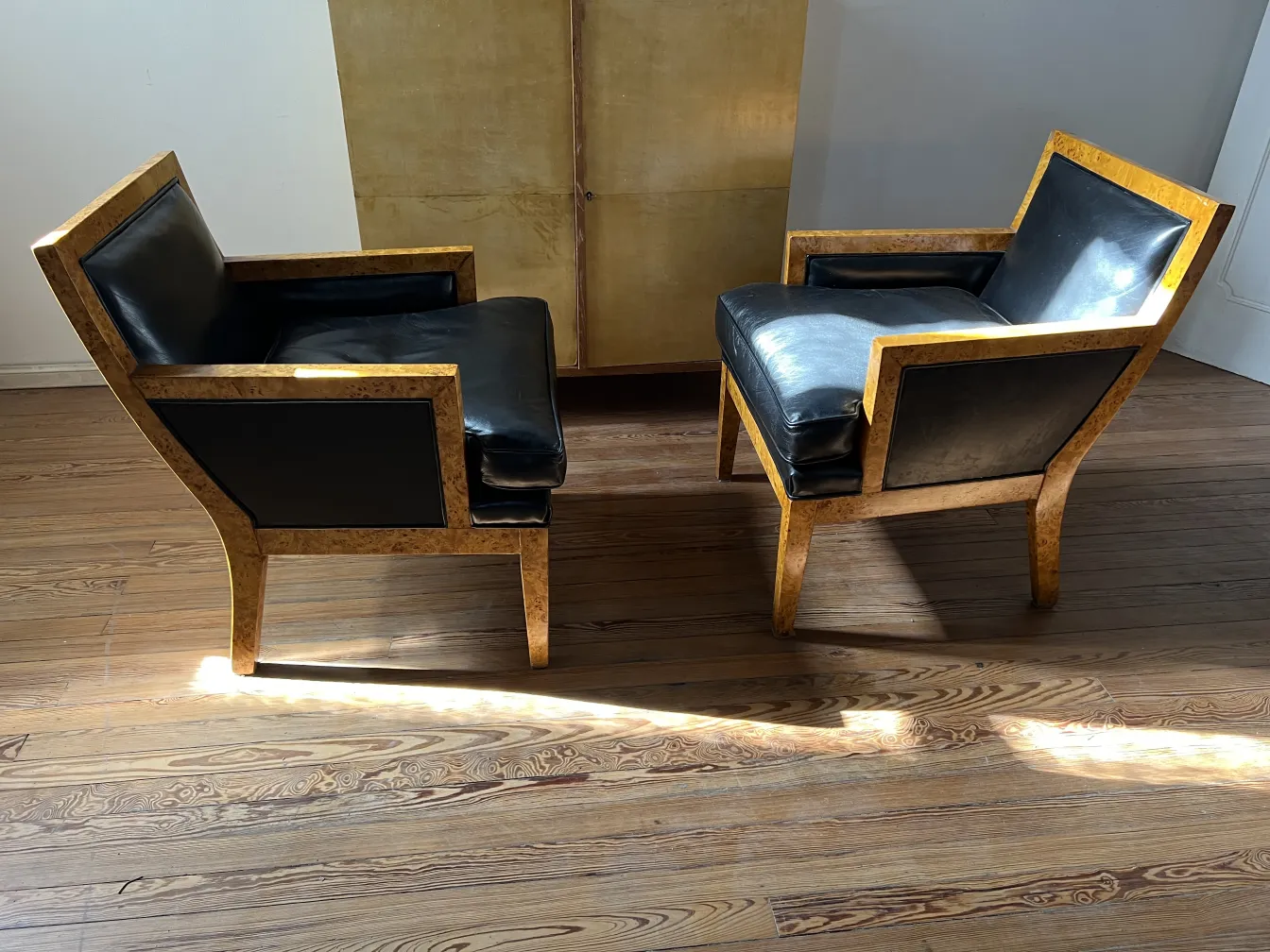 two antique armchairs with elegant design and clear shapes