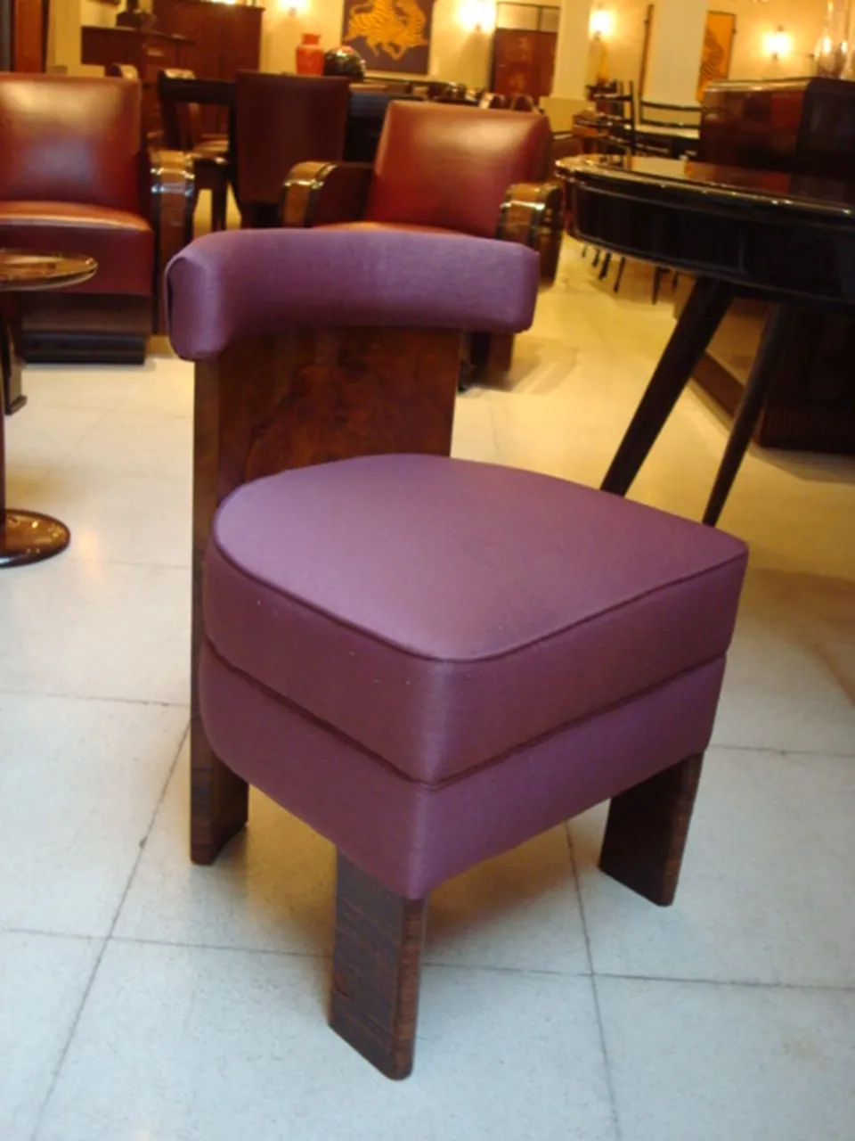 purple antique armchairs for restoration in a cozy environment