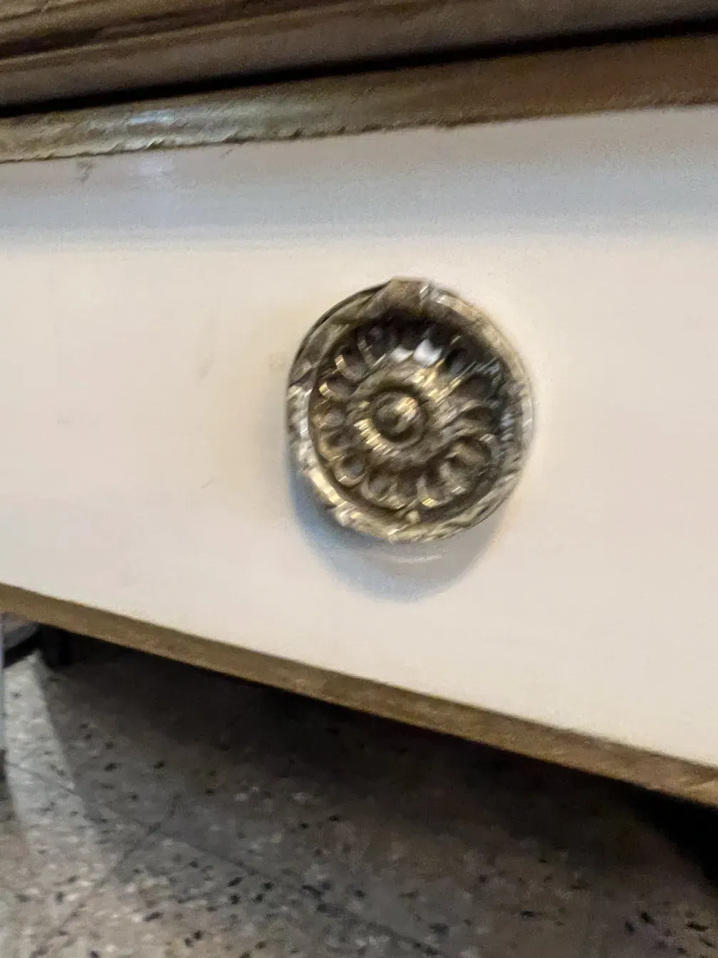 detail of a knob on the antique desk of Alvear Palace