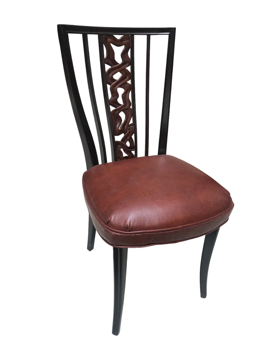 2 antique chairs featuring a decorative backrest design, perfect for enhancing classic spaces.