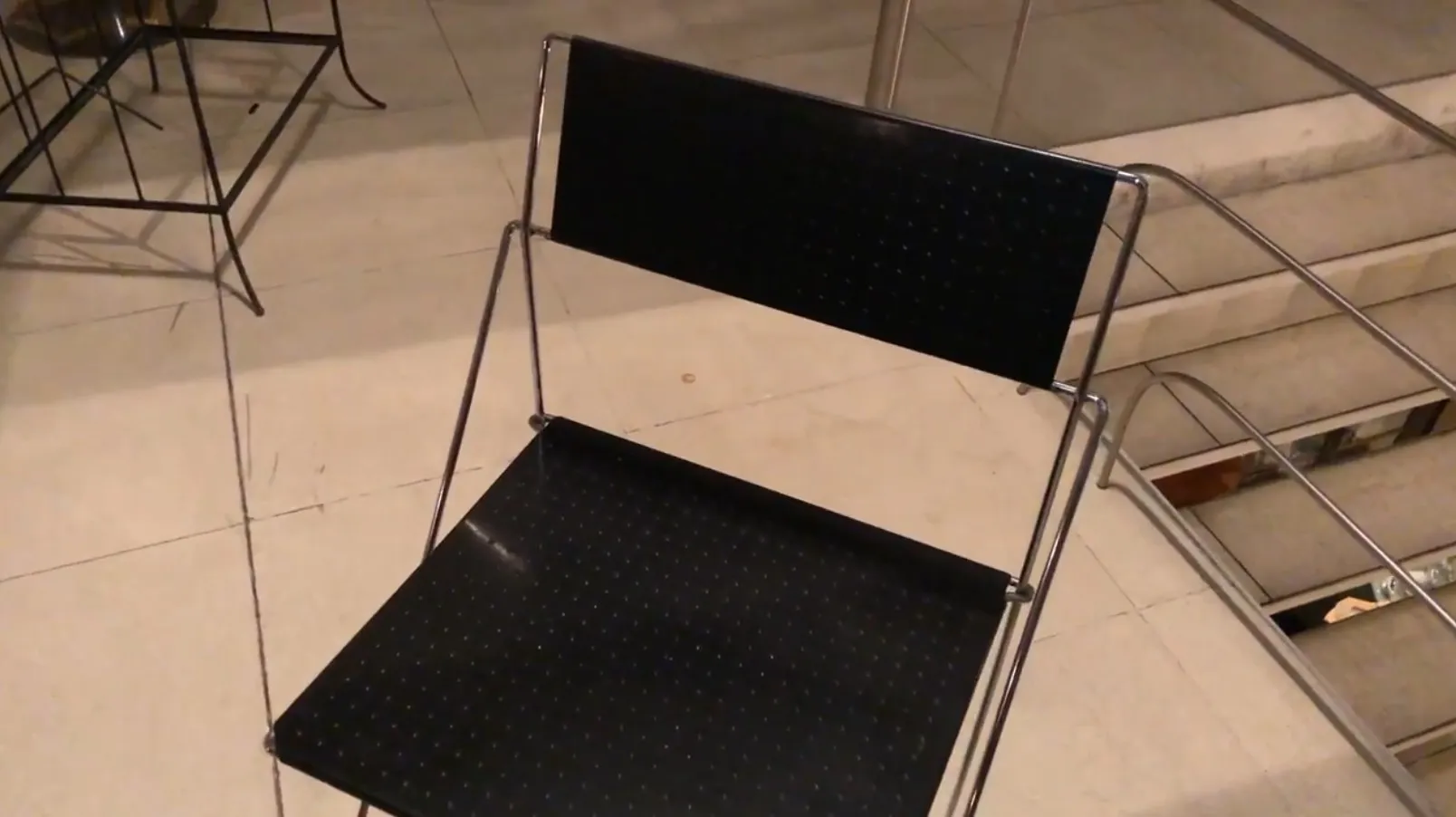 Two antique chairs in a minimalist and modern setting