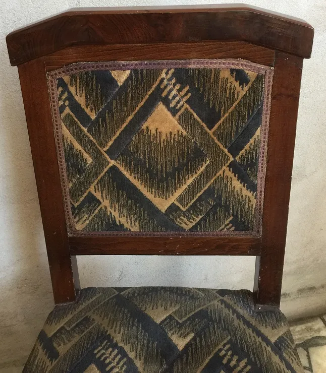 Two antique chairs with decorative backrest and upholstery