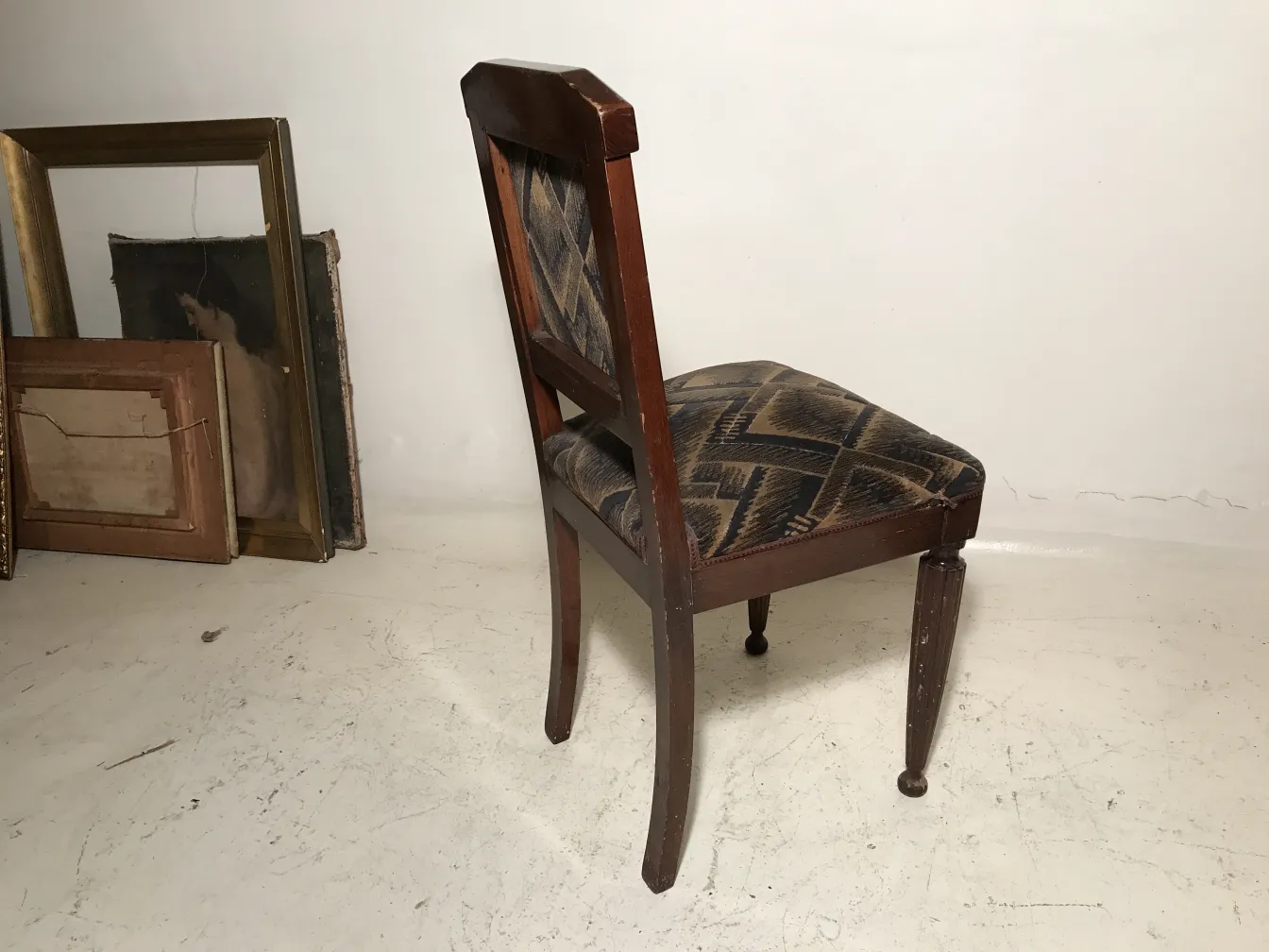 Antique chairs to restore with unique patterns.