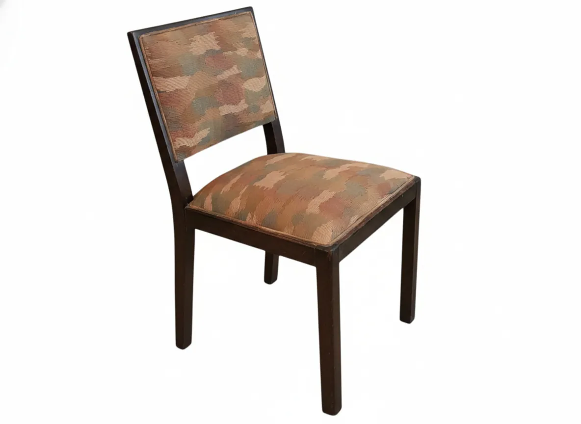 antique chair to restore with a brown patterned upholstery