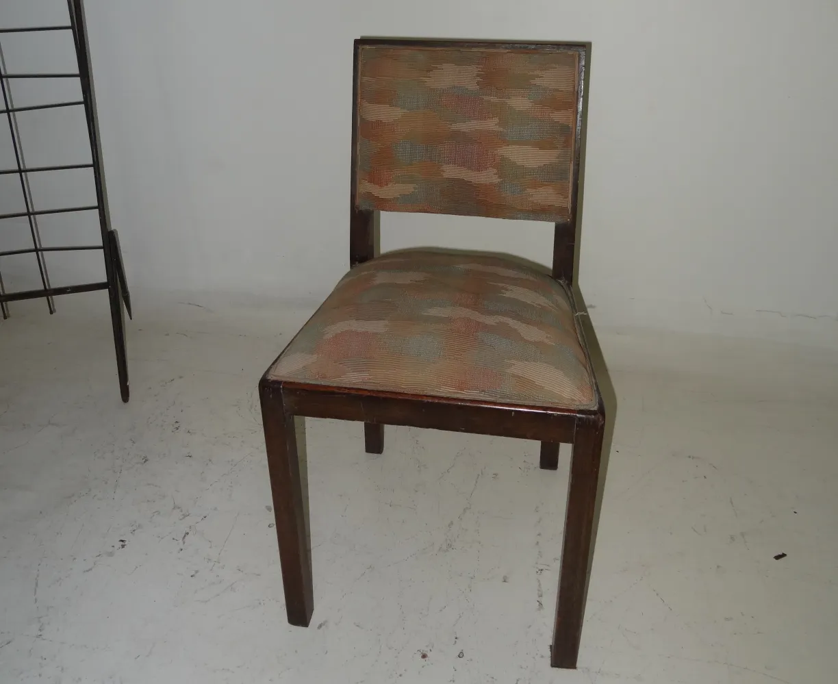 Antique art deco chair with a colorful classic design, perfect for restoration