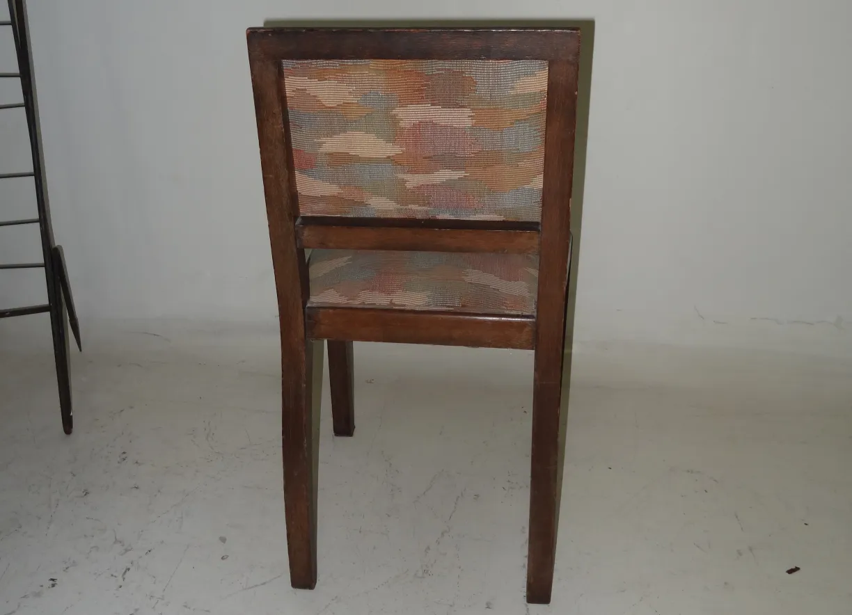 old chair to restore with colorful backrest