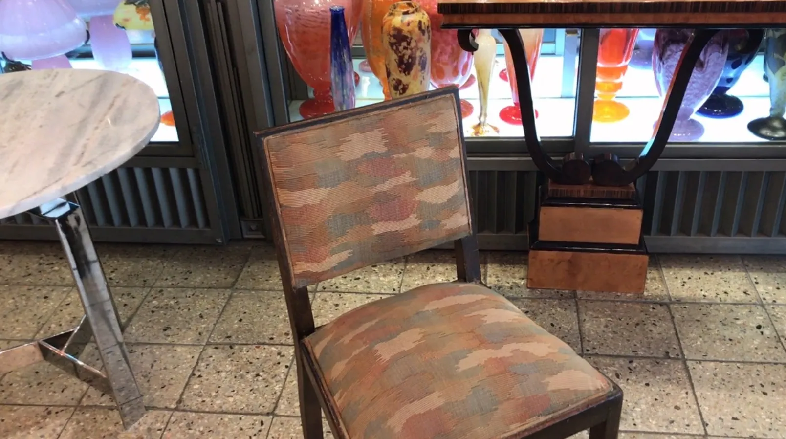 antique chair in a colorful decorative environment