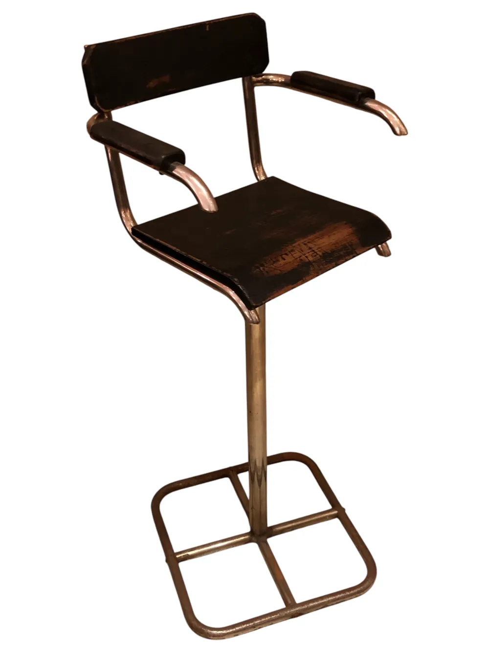 antique Brehuer chair with worn finishes and simple structure