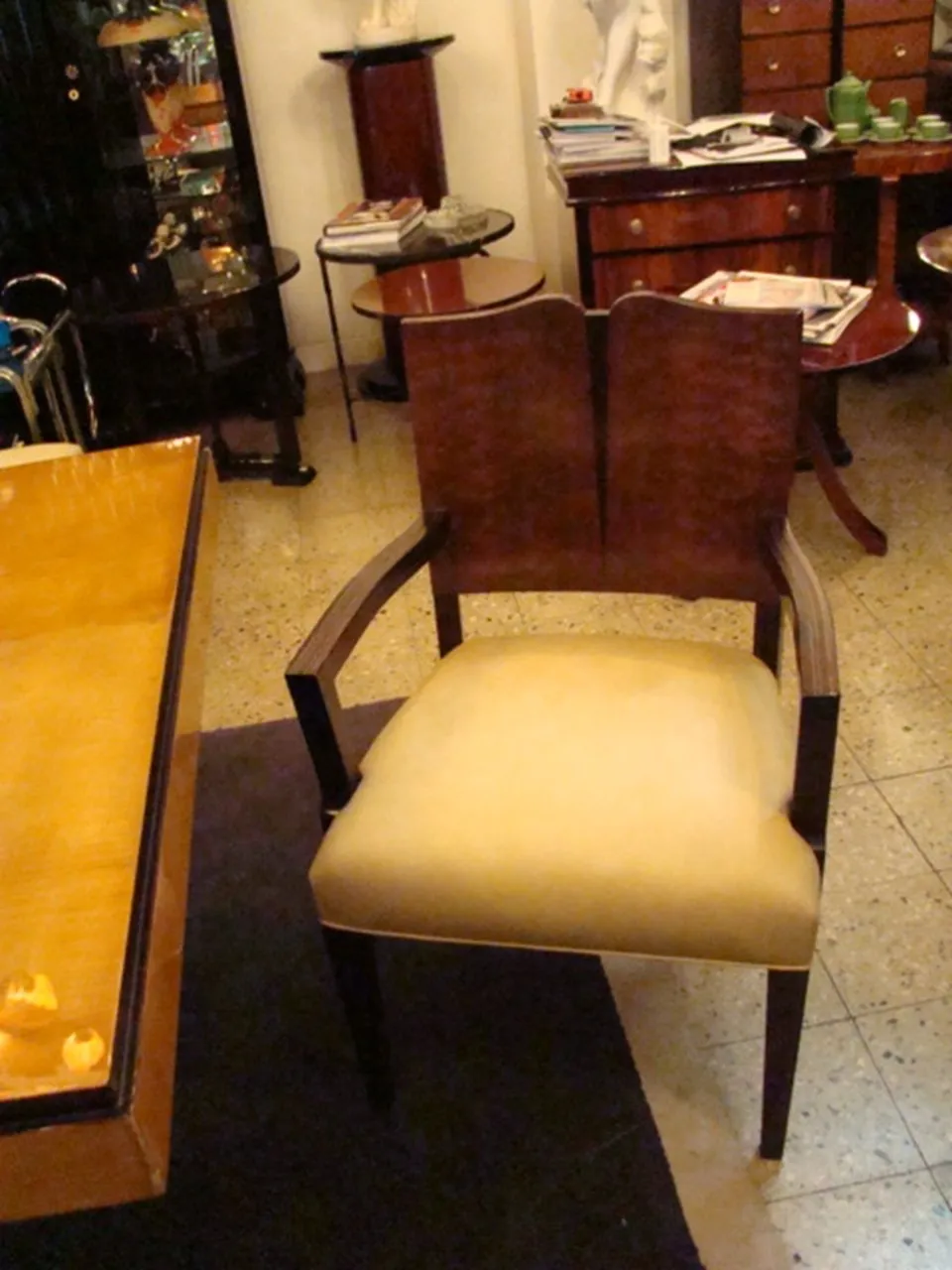 Antique armchair with Art Deco design in a stylish setting.