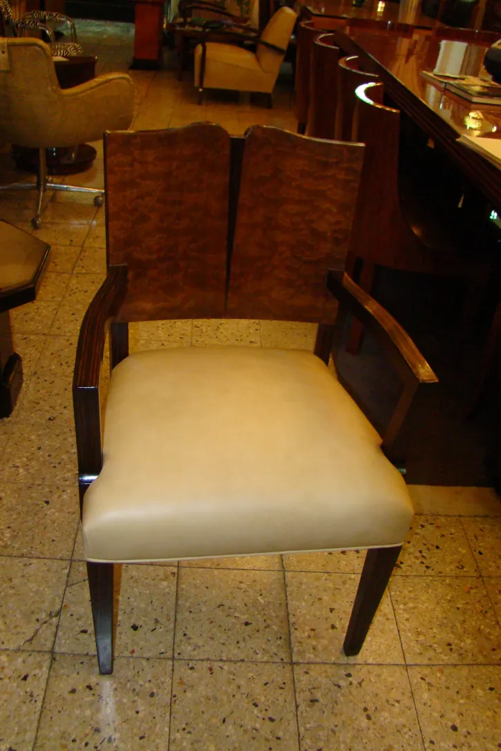 Antique Art Deco armchair with arms in a classic setting