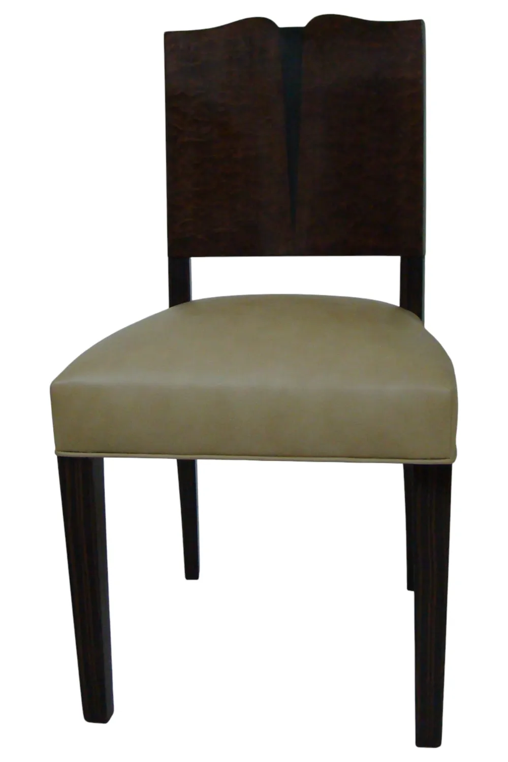 Four antique art deco chairs in a clean setting.