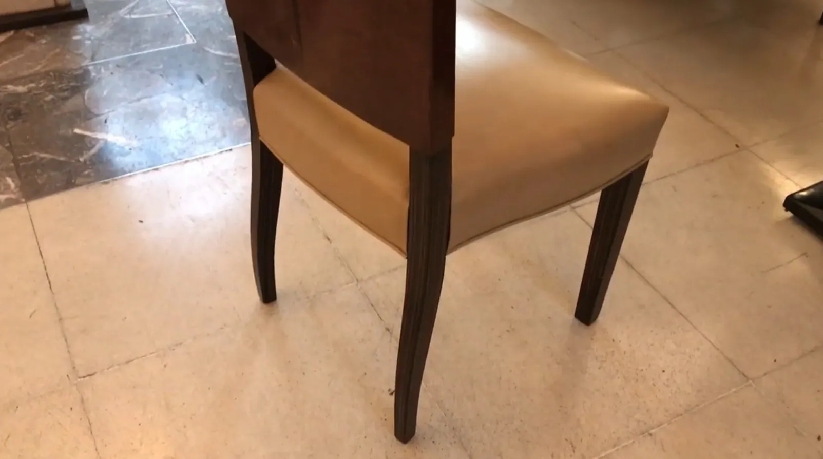 four antique chairs with elegant design and curved legs