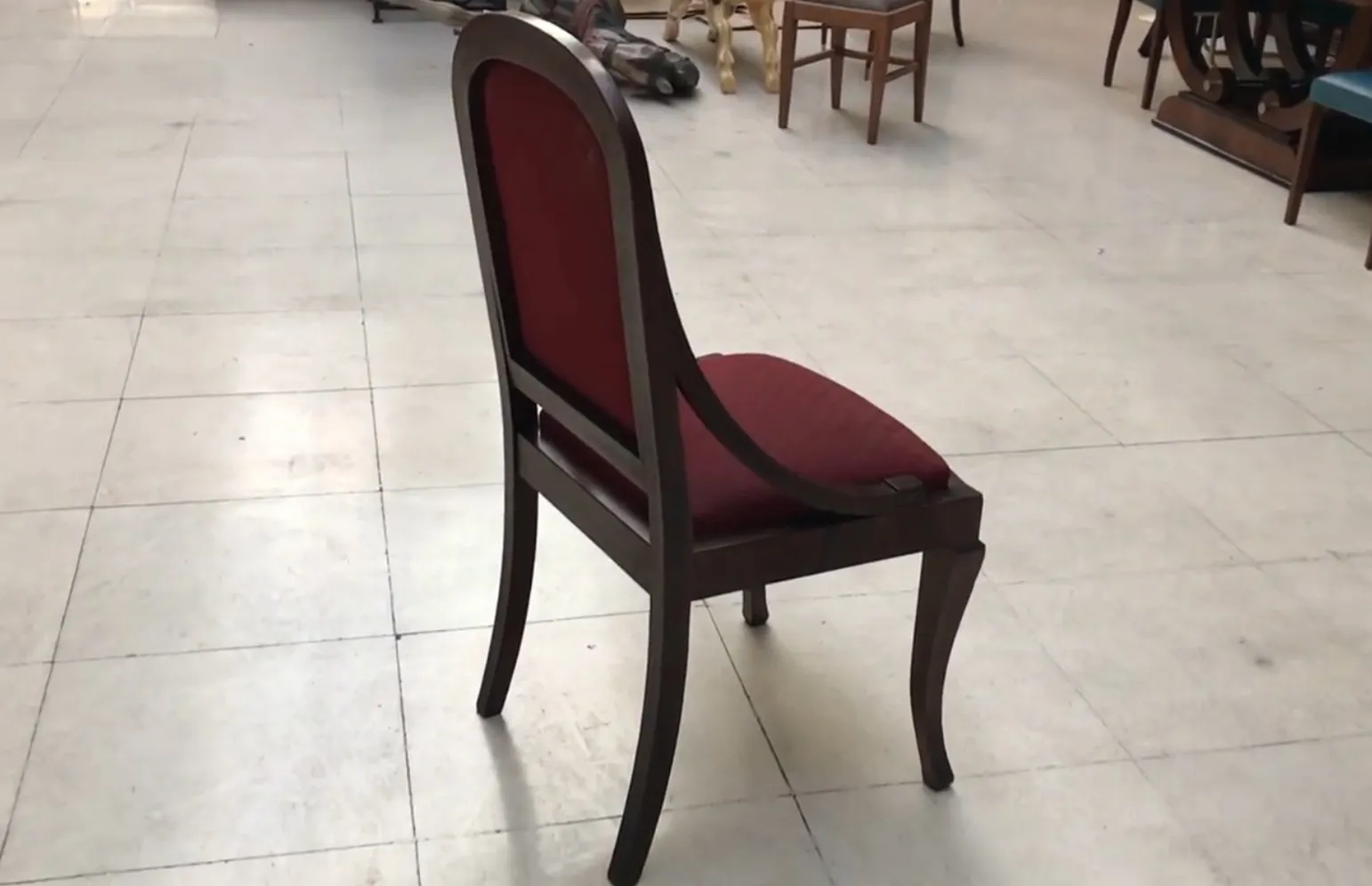 Antique chairs in a spacious environment, perfect for restoration.