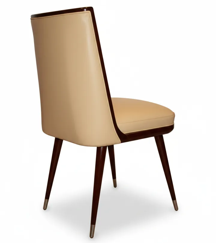 6 antique chairs with classic design, in a bright setting.