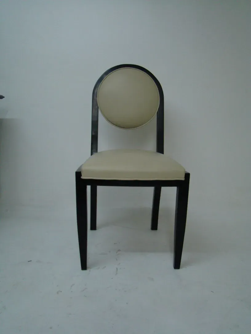 Group of 12 antique chairs with circular modern design