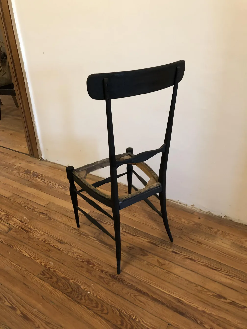Side view of antique chairs to restore, cozy environment