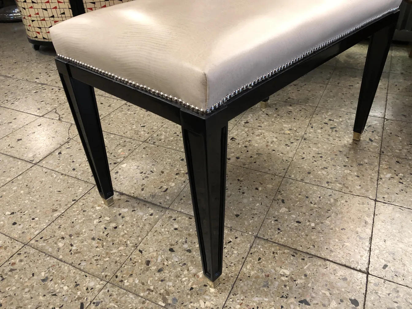 antique sidewalk chair with cream seat, elegant design