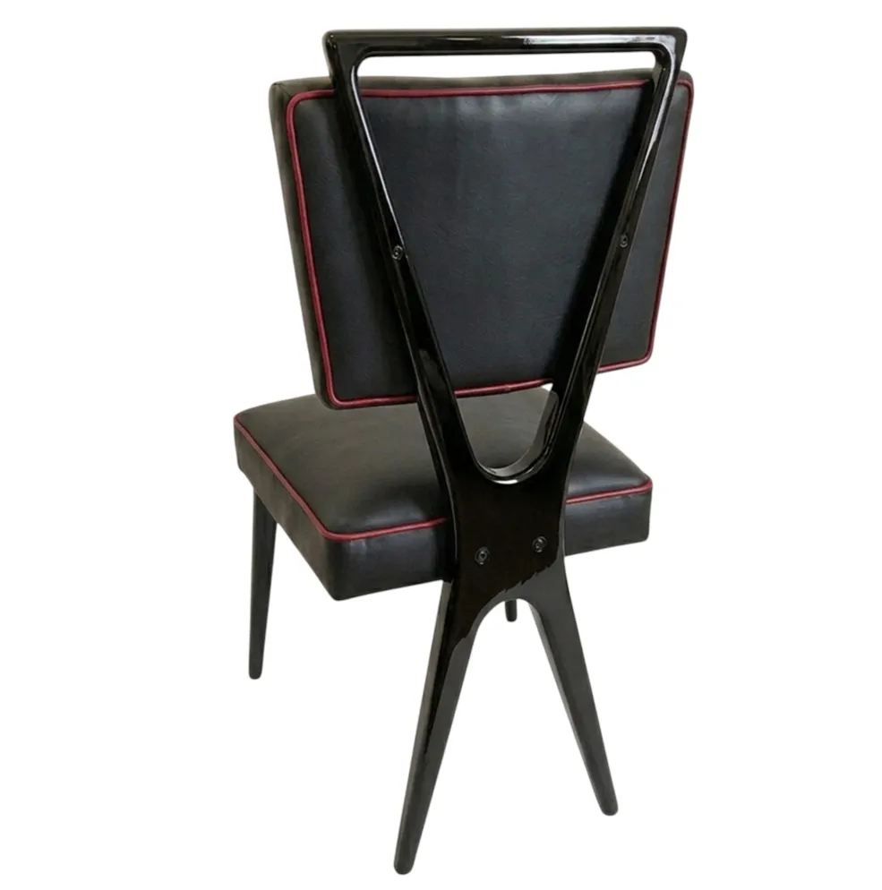 Set of 12 antique chairs with black backrest and red trim, perfect for restoration.