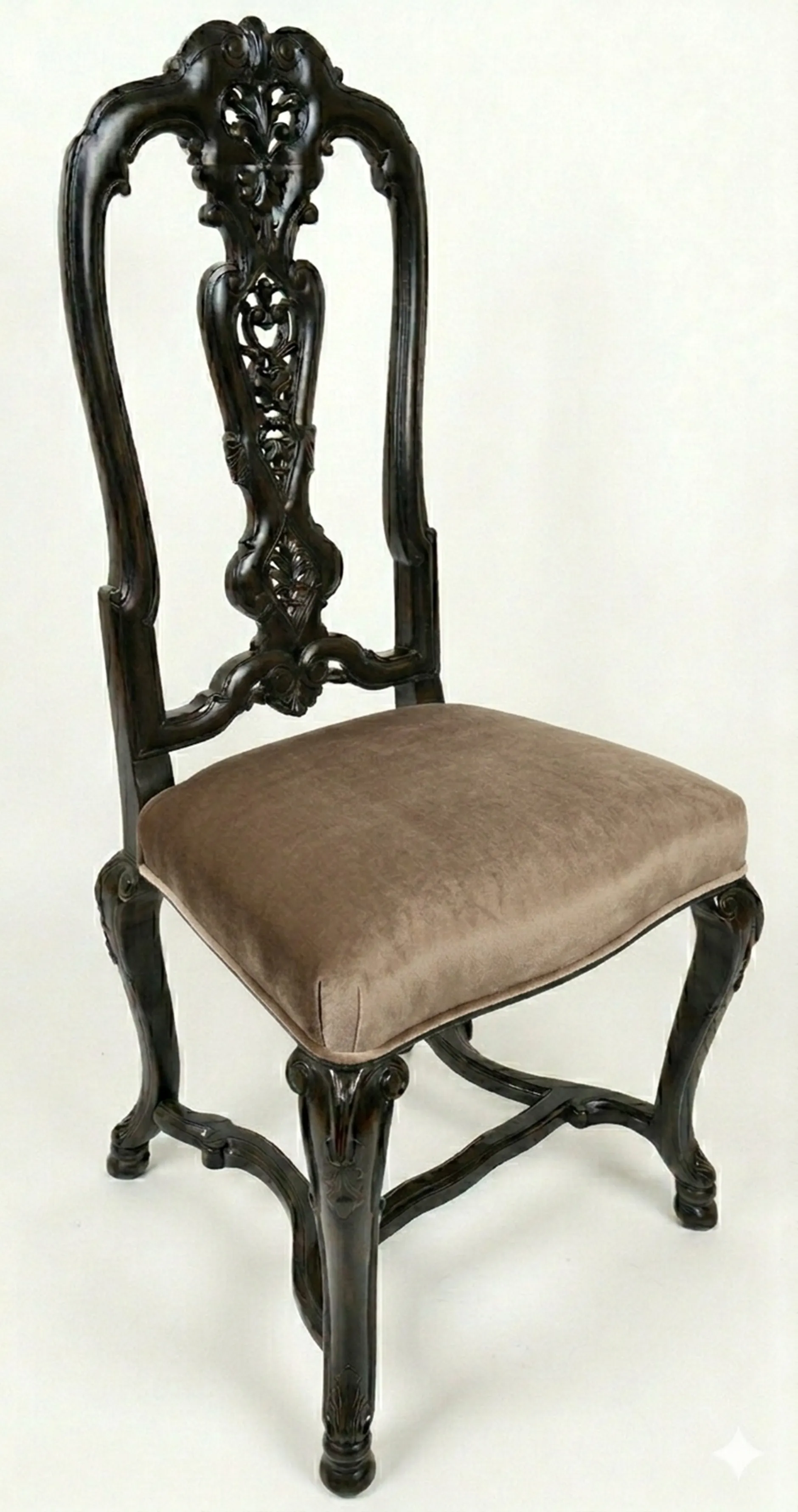 Two antique chairs with intricate design and light upholstery, ideal for restoration, in a neutral setting.