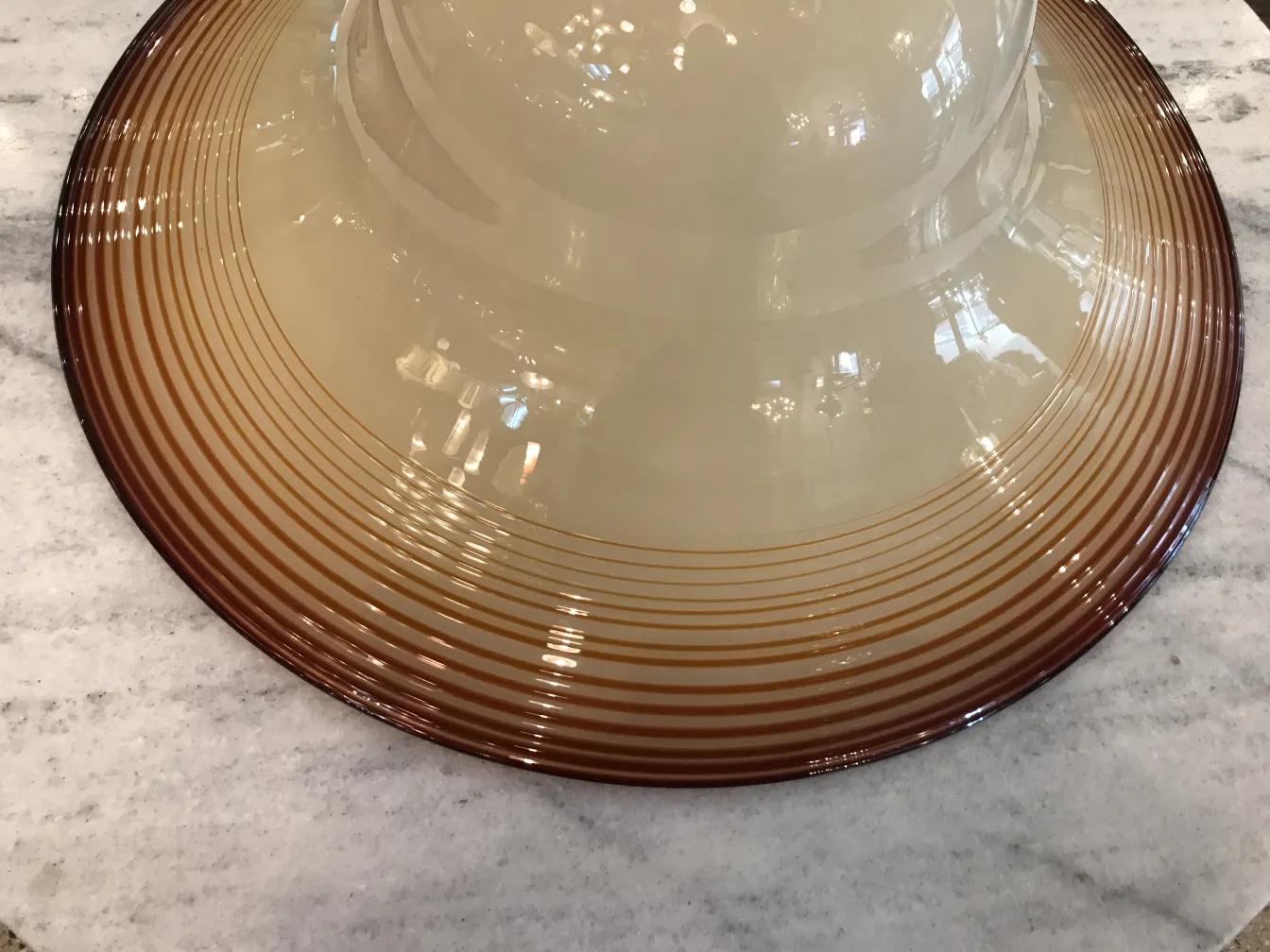 antique hanging lamp with rounded shape in light tones