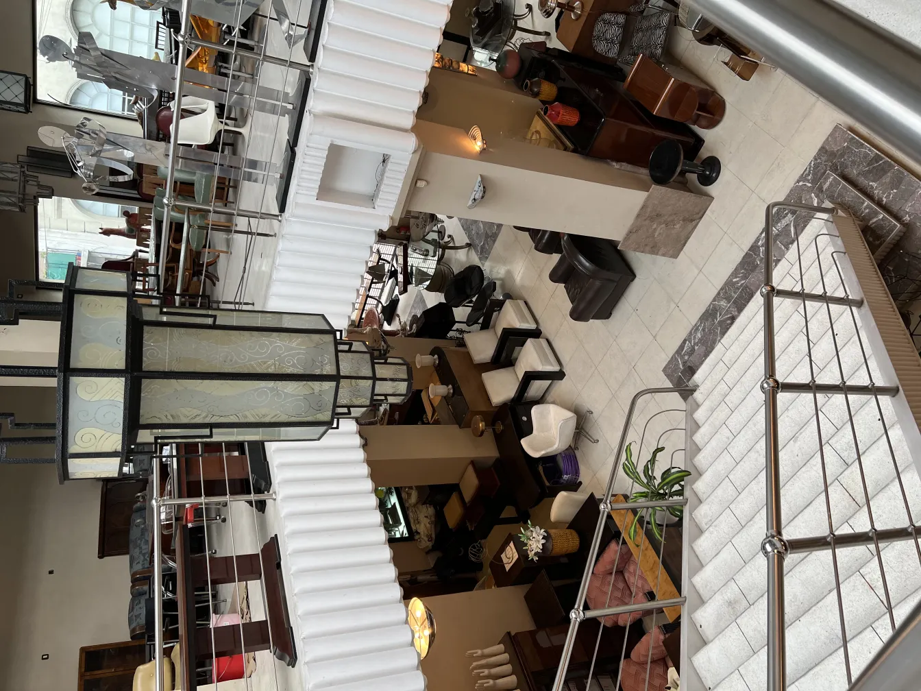 Antique lantern with decorative design in an elegant setting.